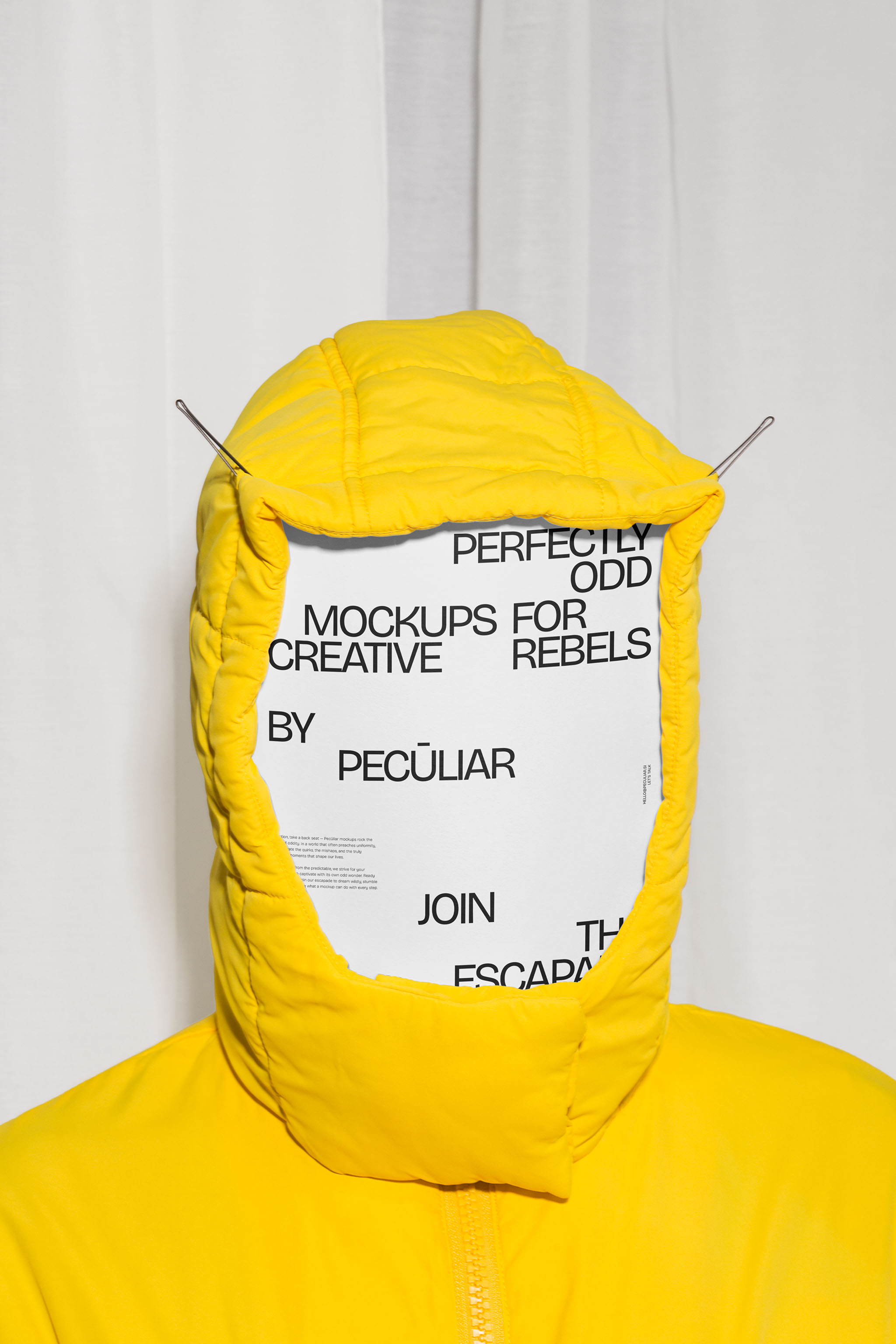 Close-up of an A5 minimalist design poster mockup hiding the face of a person in a puffer jacket against a light background, in use example.